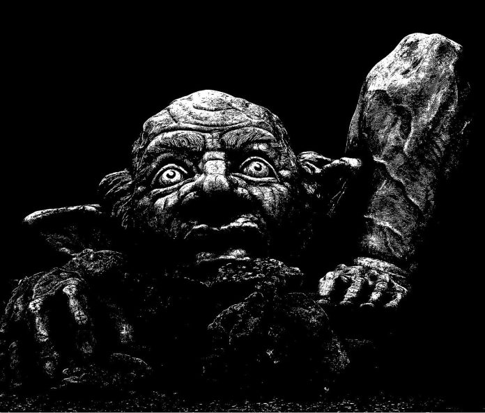 A spooky and scary sculpture of a troll, reminiscent of the terrifying atmosphere in The Necromancers by Robert Hugh Benson.