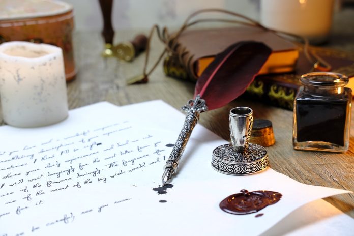 A feather pen rests on a vintage desk, creating an atmosphere reminiscent of The Holladay Case by Burton Egbert Stevenson.